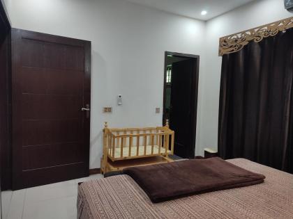Fully Serviced Holiday Home Near Lahore Ring Road - image 12