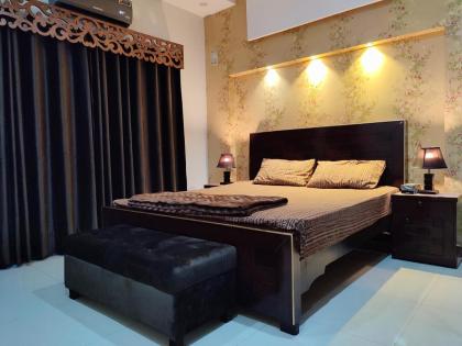 Fully Serviced Holiday Home Near Lahore Ring Road - image 4