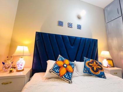 Modern and cozy apartment feels like home. - image 12