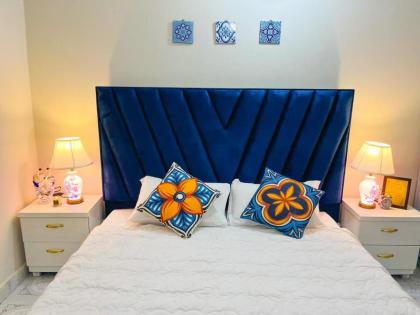 Modern and cozy apartment feels like home. - image 14