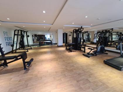 1 Bed Modern Apartment Pool Gym Cinema - image 22