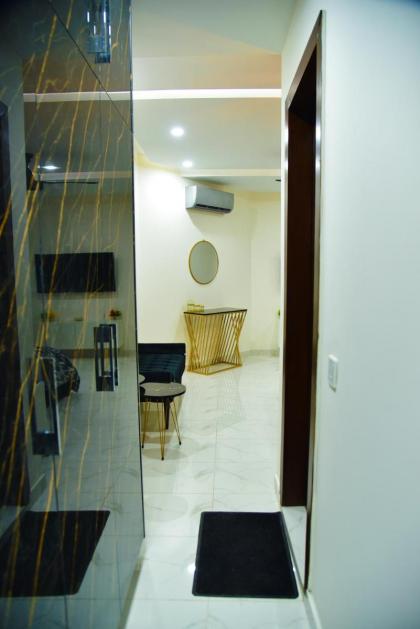 Chic Noir 1 Bedroom Apartment Gulberg - image 23
