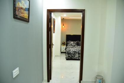 Chic Noir 1 Bedroom Apartment Gulberg - image 26