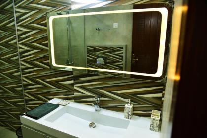 Chic Noir 1 Bedroom Apartment Gulberg - image 28