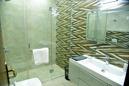 Chic Noir 1 Bedroom Apartment Gulberg - image 29