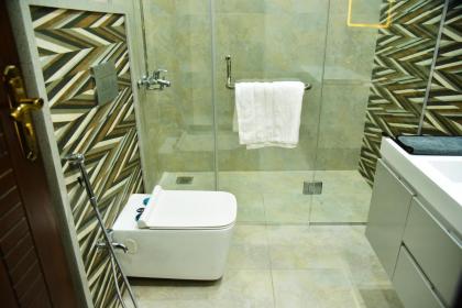 Chic Noir 1 Bedroom Apartment Gulberg - image 30