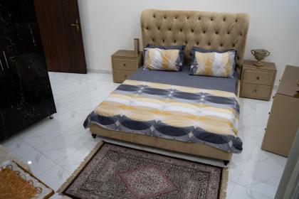 Gulberg Luxe Living 2-BR Apartment - image 30